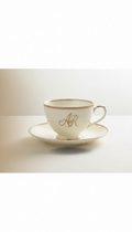 Monogrammed bone china teacup and saucer